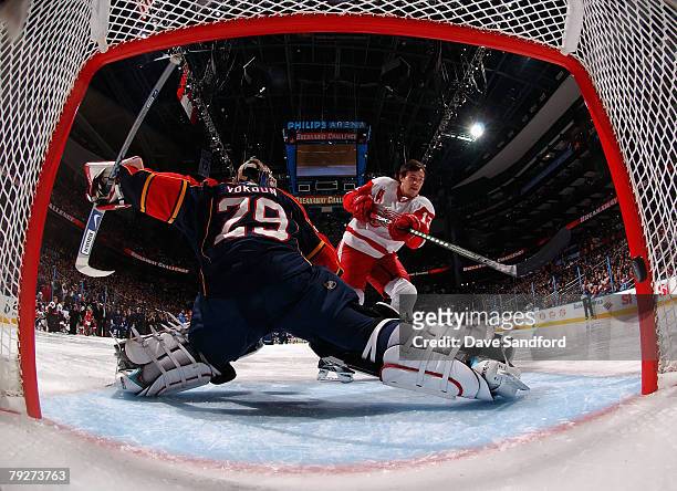 Western Conference All-Star Pavel Datsyuk of the Detroit Red Wings scores a goal on goaltender Tomas Vokoun of the Florida Panthers during the...