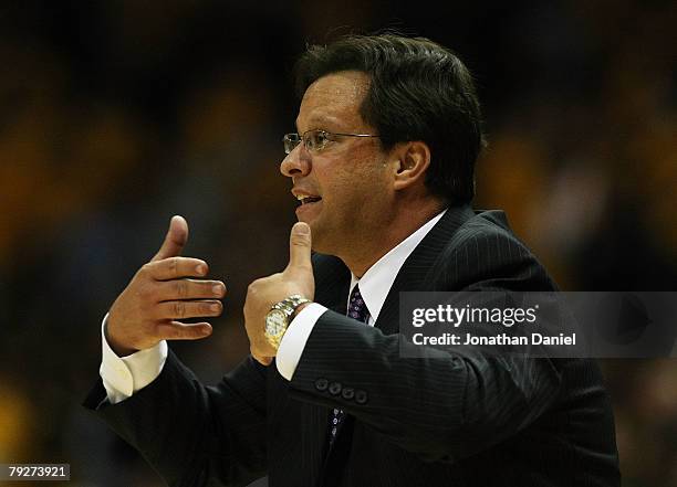 Head coach Tom Creen of the Marquette Golden Eagles gives instructions to his team against the DePaul Blue Demons at the Bradley Center January 26,...