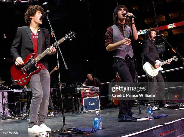 Musicians The Jonas Brothers performing at NHL Rockin' Skate 2008 at Philips Arena on January 26, 2008 in Atlanta, Georgia.