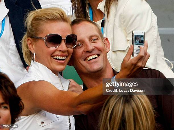 Presenters Sonia Kruger and Todd McKenney arrives to watch the men's final match between Jo-Wilfried Tsonga of France and Novak Djokovic of Serbia on...