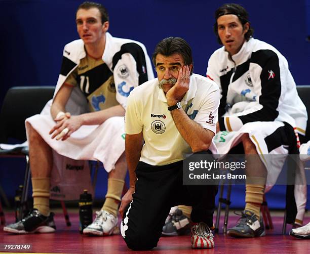 Heiner Brand, coach of Germany, looks dejected during the Men's Handball European Championship Third Place Play-off match between Germany and France...