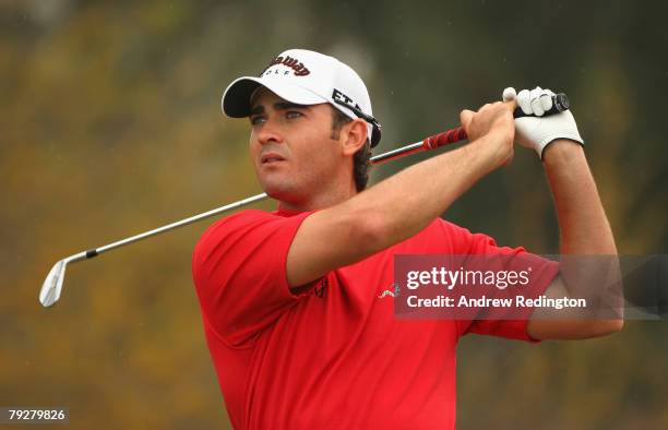 Anton Haig of South Africa watches his tee-shot on the third hole during the final round of the Commercialbank Qatar Masters at Doha Golf Club on...