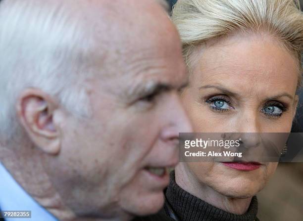 Republican presidential hopeful Sen. John McCain answers questions from the media as his wife Cindy looks on after a town hall meeting at Fantasy of...