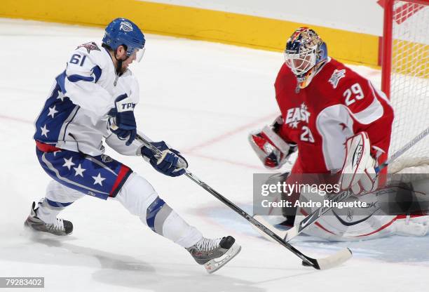 Western Conference All-Star Rick Nash of the Columbus Blue Jackets scores a goal on Tomas Vokoun of the Florida Panthers during the 56th NHL All-Star...