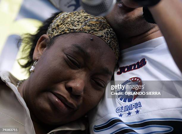 Orfilia de Palacios , the mother of Honduran footballer Edwin Rene Palacios, cries while asking for the release of her son during the Olimpia-Motagua...