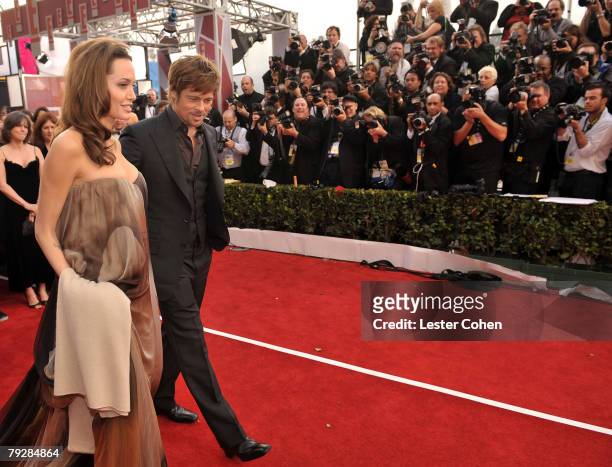 Actors Angelina Jolie and Brad Pitt arrive to the TNT/TBS broadcast of the 14th Annual Screen Actors Guild Awards at the Shrine Auditorium on January...
