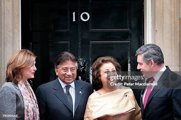 Pakistan's President Pervez Musharraf and his wife Sehba are welcomed in Downing Street by Prime Minister Gordon Brown and his wife Sarah on January...