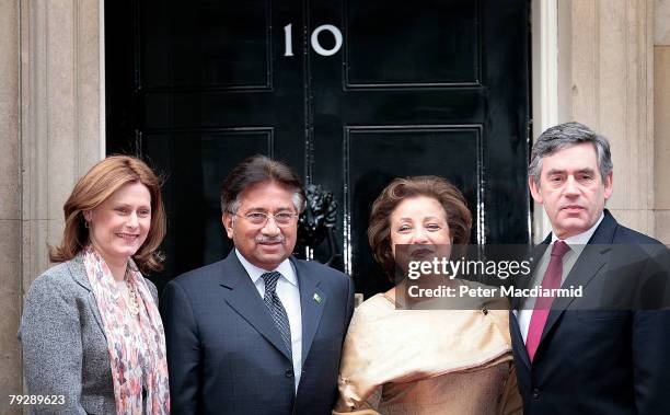 Pakistan's President Pervez Musharraf and his wife Sehba are welcomed in Downing Street by Prime Minister Gordon Brown and his wife Sarah on January...