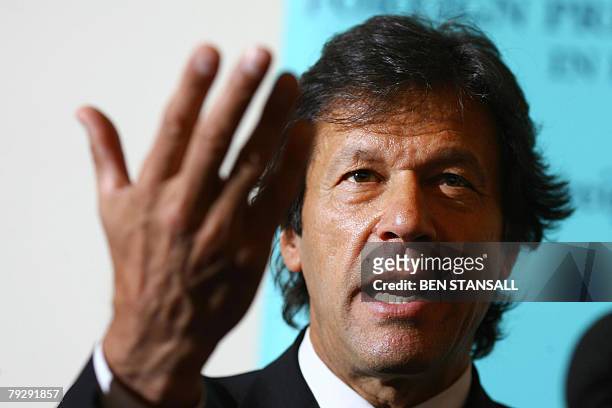 Former Pakistan cricketer and opposition leader Imran Khan speaks during a press conference at the Foreign Press Association in London, 28 January...