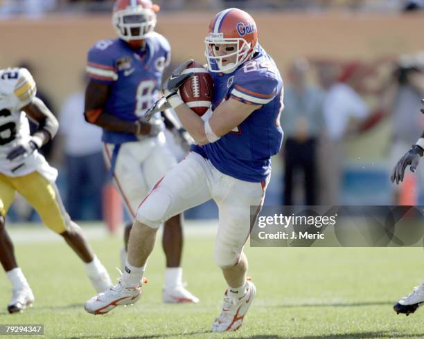 Florida tight end Tate Casey looks for extra yardage as some Iowa defenders close in during Monday's Outback Bowl in Tampa, Florida on January 2,...