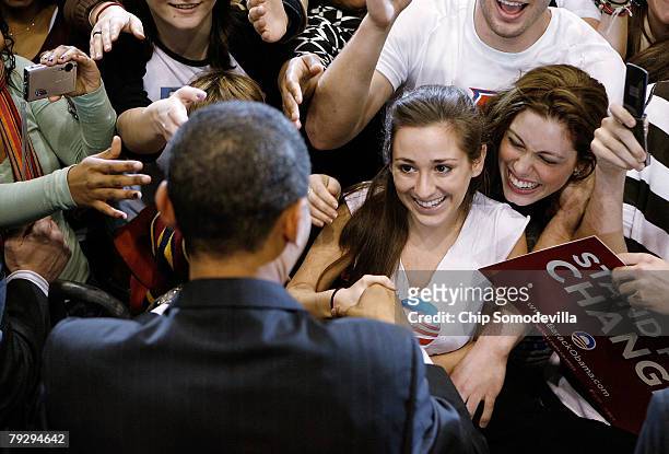Young supporters surge forward for the chance to shake hands with Sen. Barack Obama during a rally in the Bender Arena at American University January...