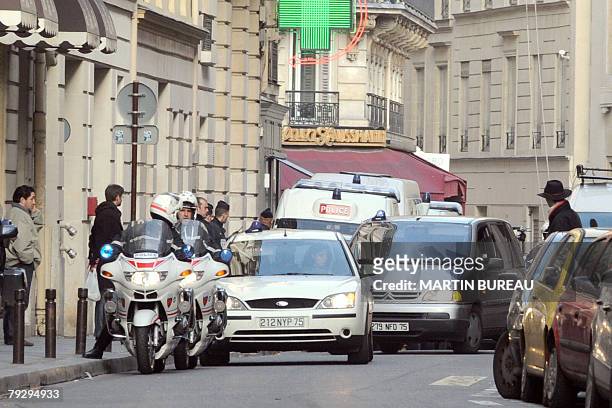 Car carrying Jerome Kerviel, the French trader who allegedly cost banking giant Societe Generale 4.90 billion euros in losse, arrives at the...