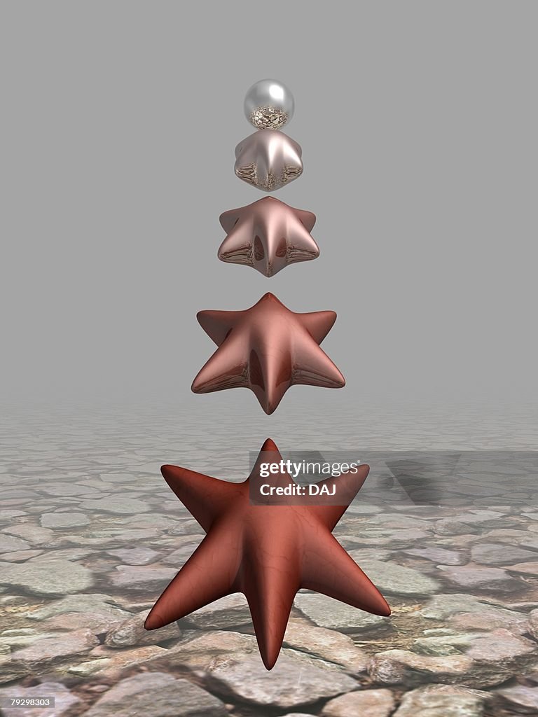 Metallic ball changing into figure of starfish step by step
