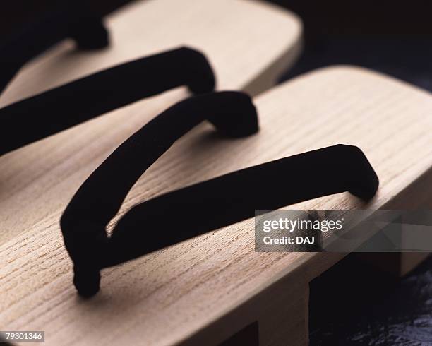 japanese sandals, high angle view, close up, japan, differential focus - geta sandal stock-fotos und bilder