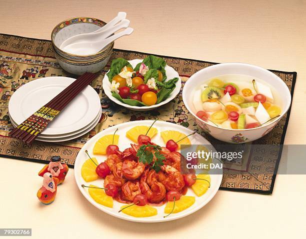 shrimp with chili sauce, salad and almond jelly, high angle view, orange background - almond jelly stock pictures, royalty-free photos & images