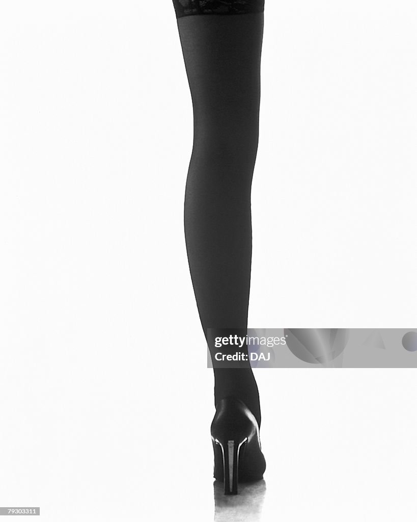 Photography of womans leg with high heel, Rear View, Black and White