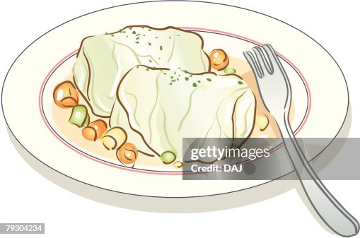 Cabbage rolls on plate with spoon Cabbage rolls on plate with spoon
