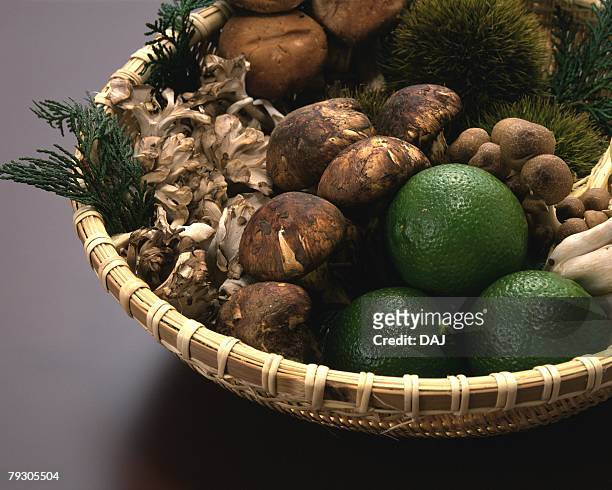 variety types of vegetables on bamboo basket, high angle view - klapperschwamm stock-fotos und bilder