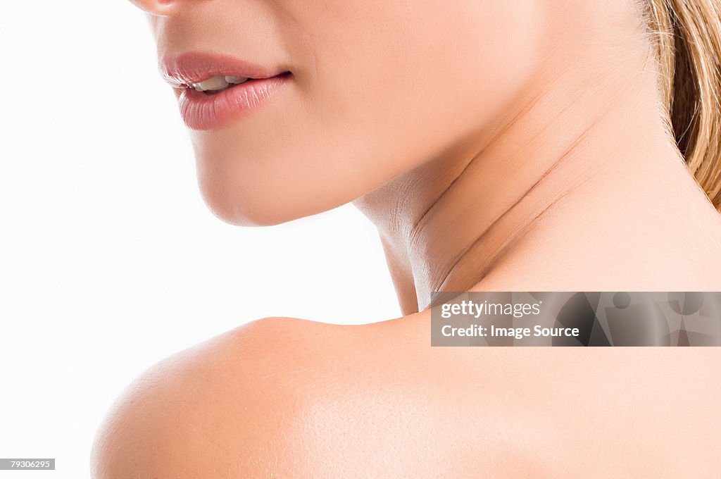 Chin neck and shoulder of a woman