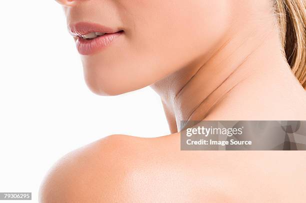chin neck and shoulder of a woman - woman's neck stock pictures, royalty-free photos & images