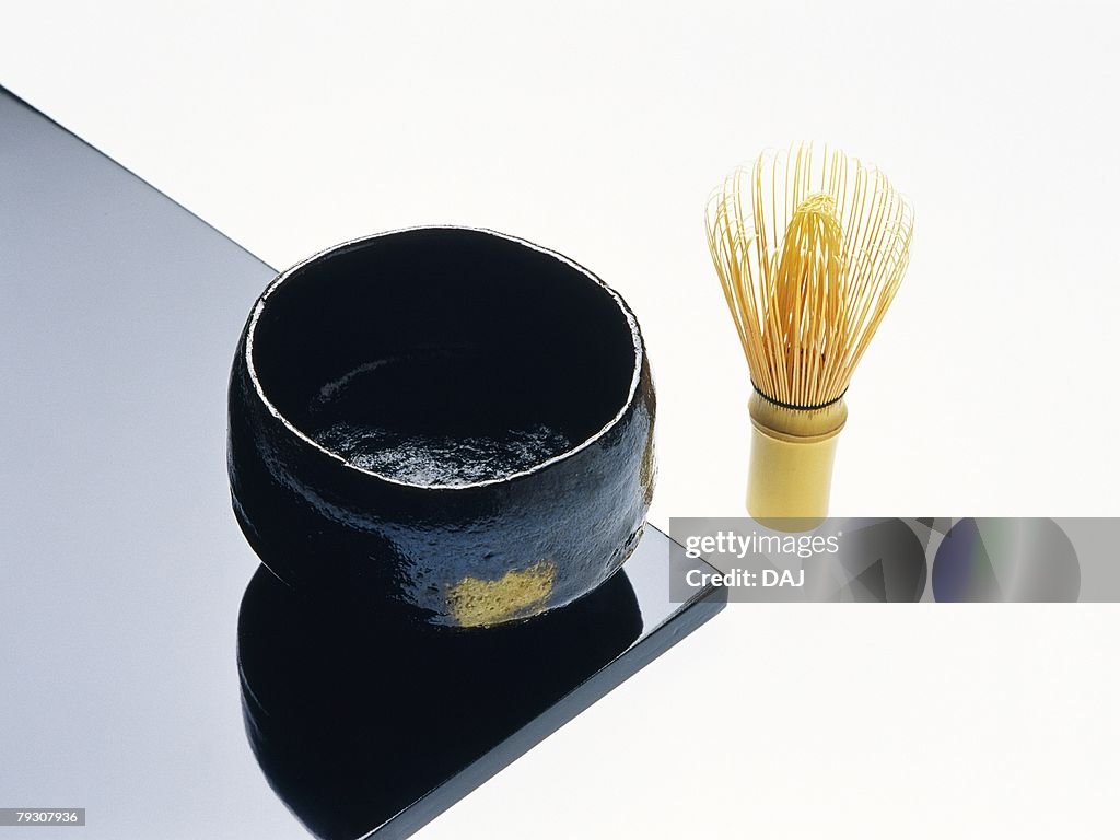 A Japanese tea whisk and a cup, Close Up, High Angle View