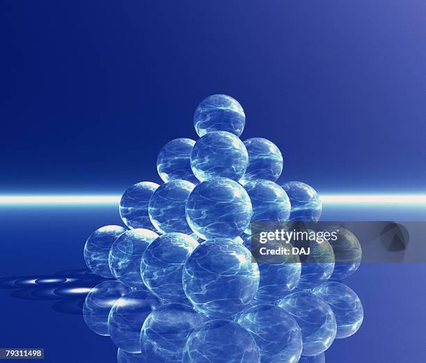 stack of orbs (triangular pyramid) , side view, composite - 三角錐 ストックフォトと画像