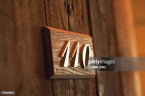 close up image of room number, close up, in focus, out focus, differential focus, side view - door name plate stock pictures, royalty-free photos & images