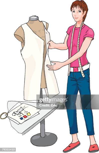 female designer working on her design, illustration - fashion designer mannequin stock illustrations