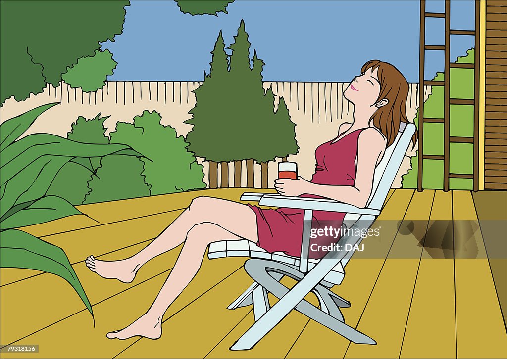 Woman sitting crossed leg at knee, closing eyes, side view