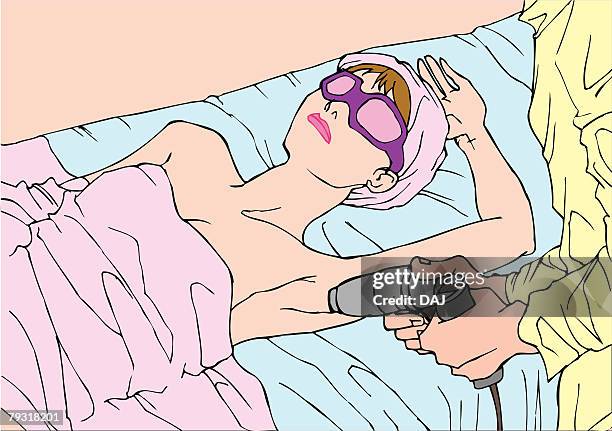 woman taking permanent epilation on her under arm in beauty parlour, high angle view - person lying on back stock illustrations