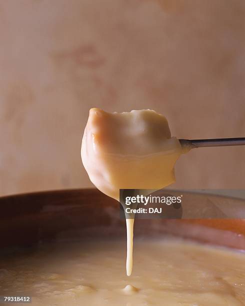 cheese fondue, close up - cheese fondue stock pictures, royalty-free photos & images