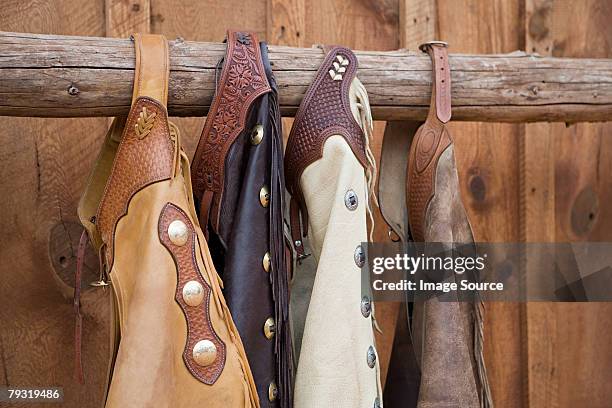 chaps - chaparreras fotografías e imágenes de stock