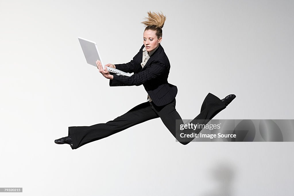 An office worker jumping