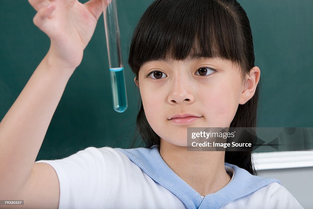 A girl doing a science experiment