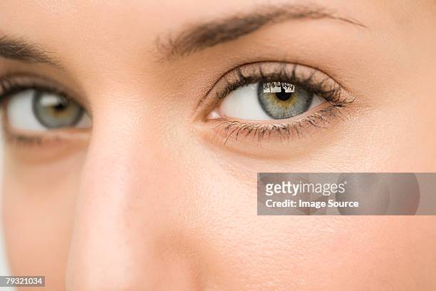 close up of a young womans eyes - woman mascara stock pictures, royalty-free photos & images