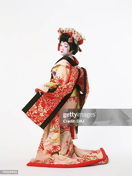 portrait of a kabuki actor acting as a female, rear view - kabuki stock-fotos und bilder