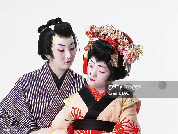 portrait of two kabuki actors, one acting as female, front view - kabuki stock-fotos und bilder