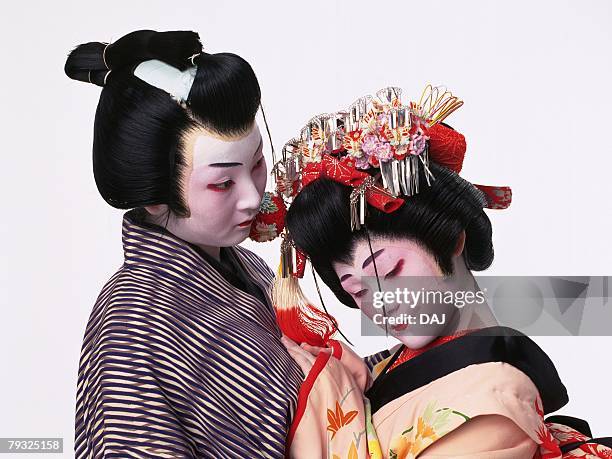 portrait of two kabuki actors, one acting as female, side view - kabuki stock-fotos und bilder