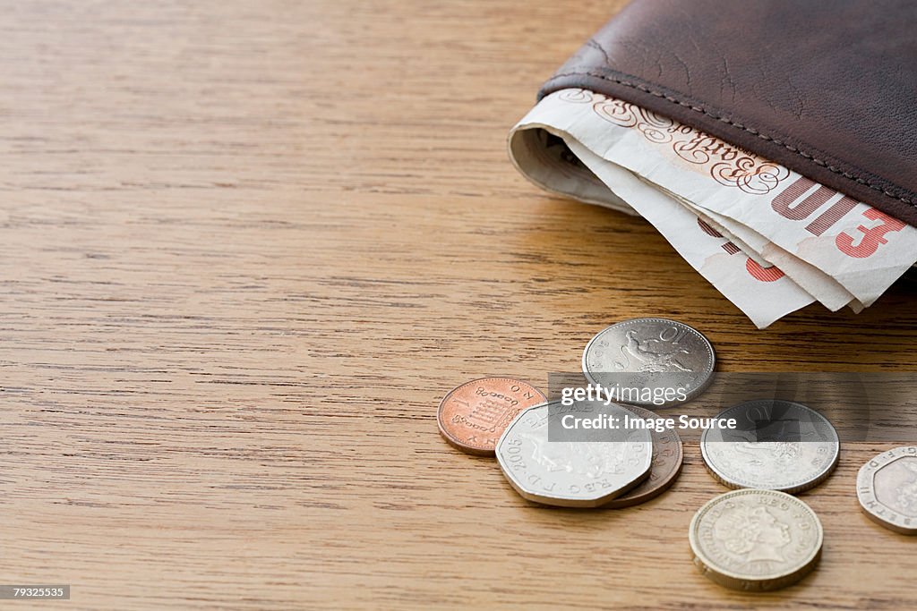 A wallet and money