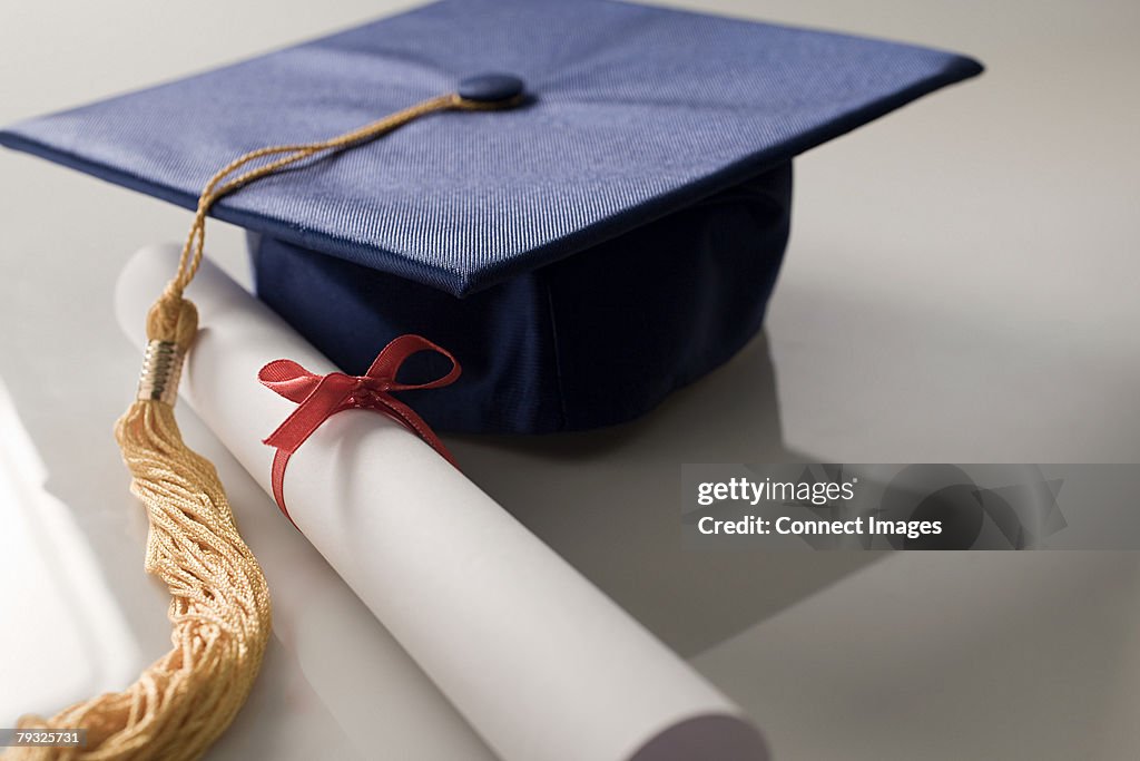 Scroll and mortarboard