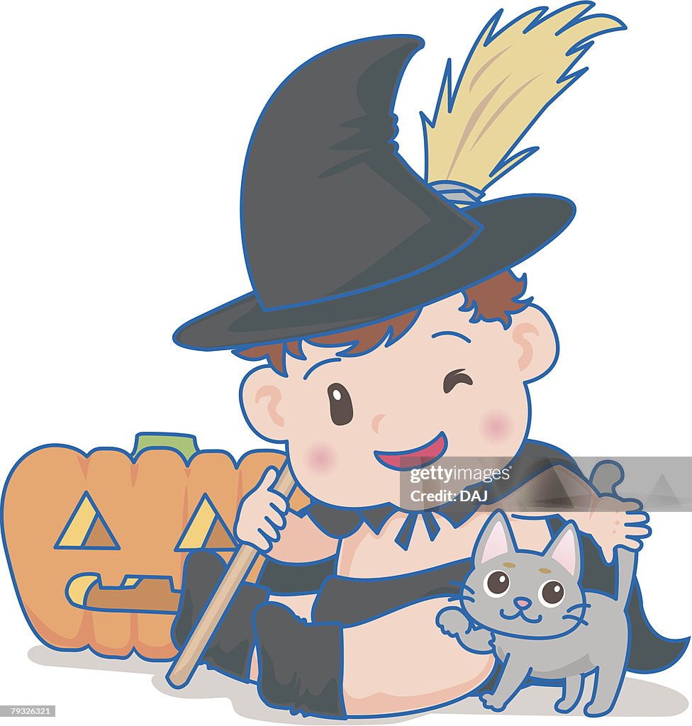 Baby dressed up as a witch holding Halloween broom