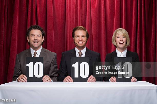three competition judges - scorecard stock pictures, royalty-free photos & images