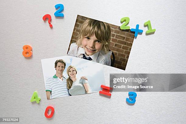 photos on a fridge  - fridge magnet stock pictures, royalty-free photos & images