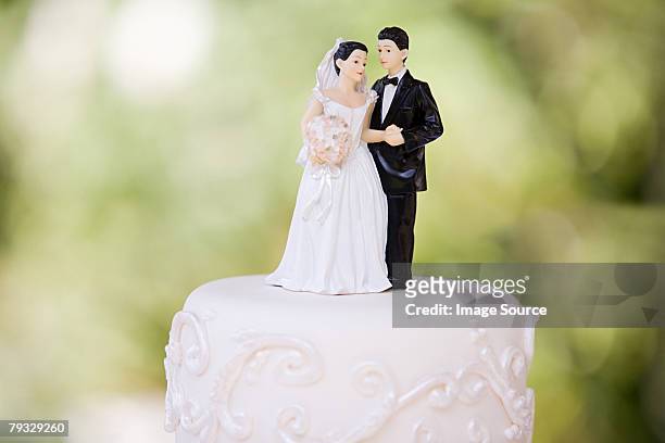 bride and groom figurines - married stock pictures, royalty-free photos & images
