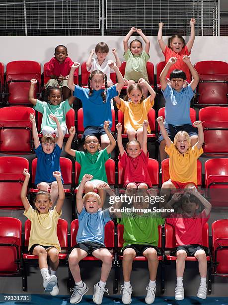 kids cheering - åskådarläktare bildbanksfoton och bilder