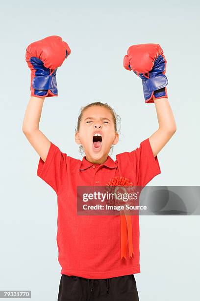 girl boxing champion - boxing glove coloured background stock pictures, royalty-free photos & images