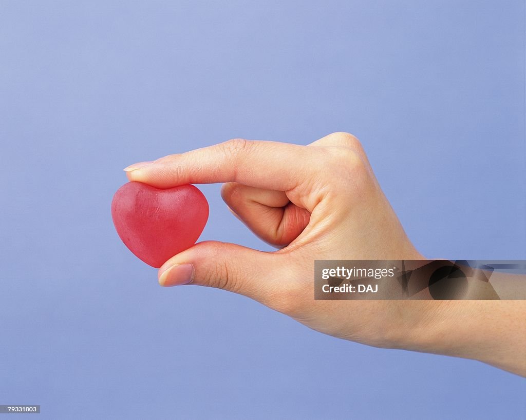 Image of Right Hand Picking a Heart, Side View