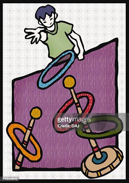 boy playing japanese ring toss, front view - ring toss stock illustrations