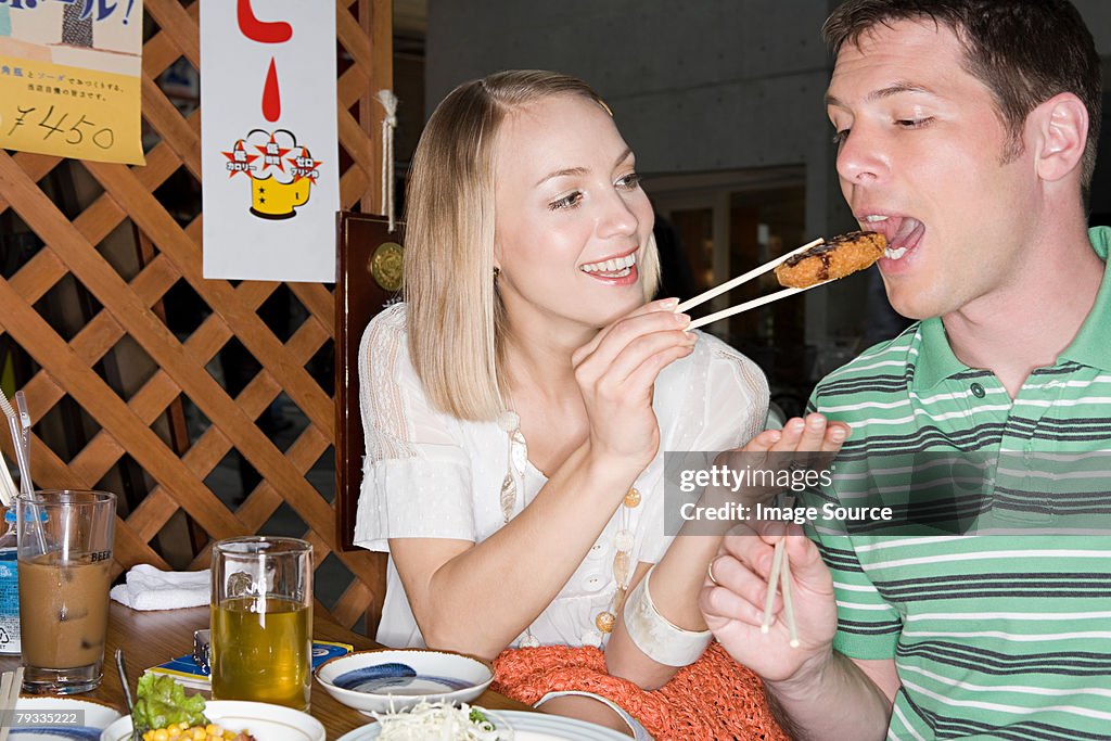 Couple eating in a japanese restaurant