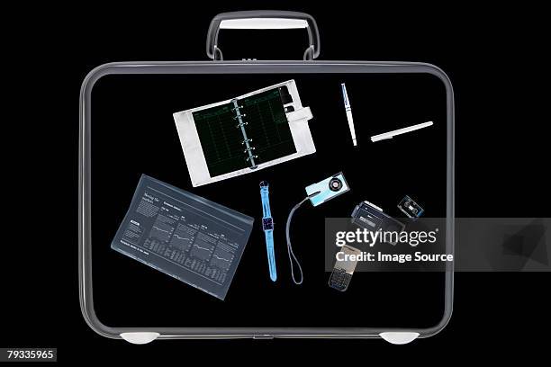 x ray of objects in briefcase - airport x ray images stock pictures, royalty-free photos & images